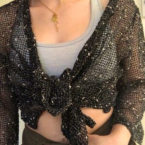 One size fits all vintage fishnet shrug. Can be worn as shawl or tied top.
